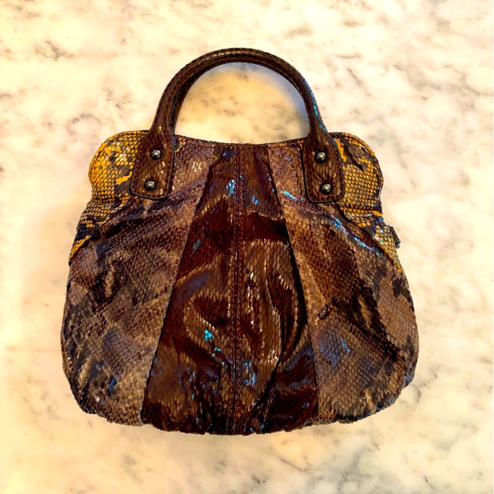 Nine West mini snake skin bag with cross body strap and handle’s brown tones